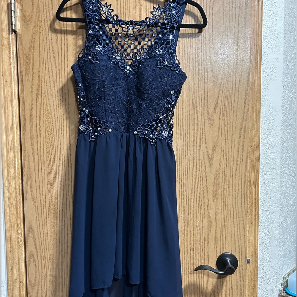A blue heart shaped in the front dress